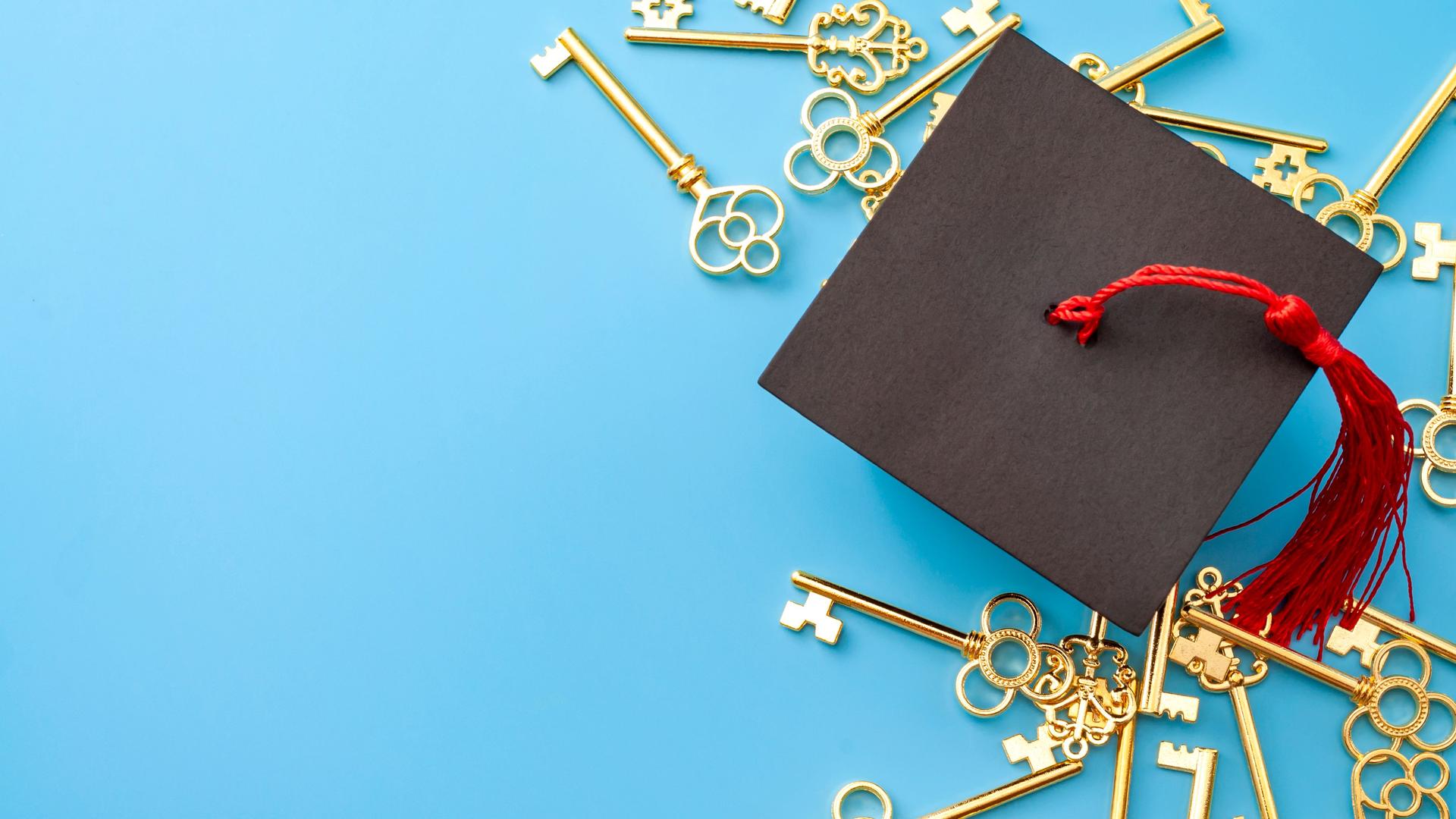 College education is the key to success, university graduation, academic opportunity and successful graduate concept with mortar board cap and gold keys isolated on blue background with copy space